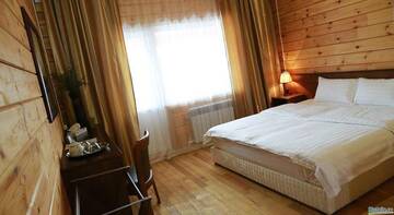 Фото номера Двухместный номер с 1 кроватью Гостиница Novik Country Club г. Владивосток 6