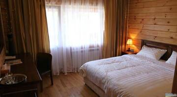 Фото номера Двухместный номер с 1 кроватью Гостиница Novik Country Club г. Владивосток 3