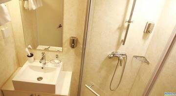Фото номера Двухместный номер с 2 отдельными кроватями Гостиница Novik Country Club г. Владивосток 6