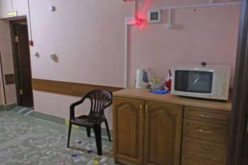 Фото номера Двухместный номер с 2 отдельными кроватями и общей ванной комнатой Гостиница Atlant г. Владивосток 3
