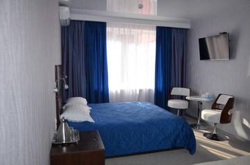 Фото номера Трехместный номер Делюкс Гостиница Boutique Hotel Cruise г. Владивосток 6