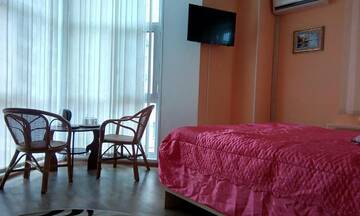 Фото номера Двухместный номер с двуспальной кроватью Гостиница Filin i Sova Mini Hotel г. Владивосток 6