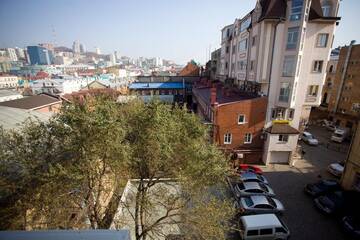 Фото номера Люкс с видом на город Апартаменты Apart Hotel Arbat Vladivostok г. Владивосток 7