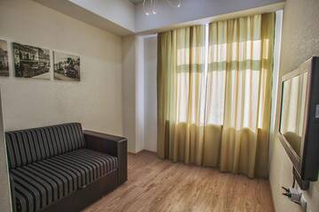 Фото номера Люкс с 1 спальней Апартаменты Apart Hotel Arbat Vladivostok г. Владивосток 3